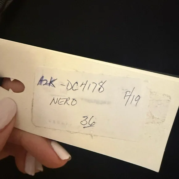 Elegant Black Long Sleeve Blouse with Feather Detail - Picture 9 of 11